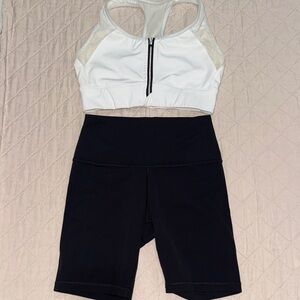 Athleta Black Bike Shorts and white zip up sports bra